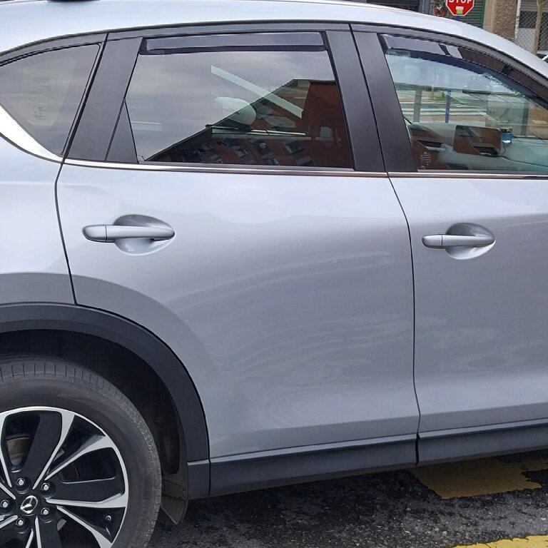 Taxi: Mazda