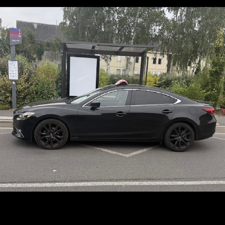 Taxi: Mazda