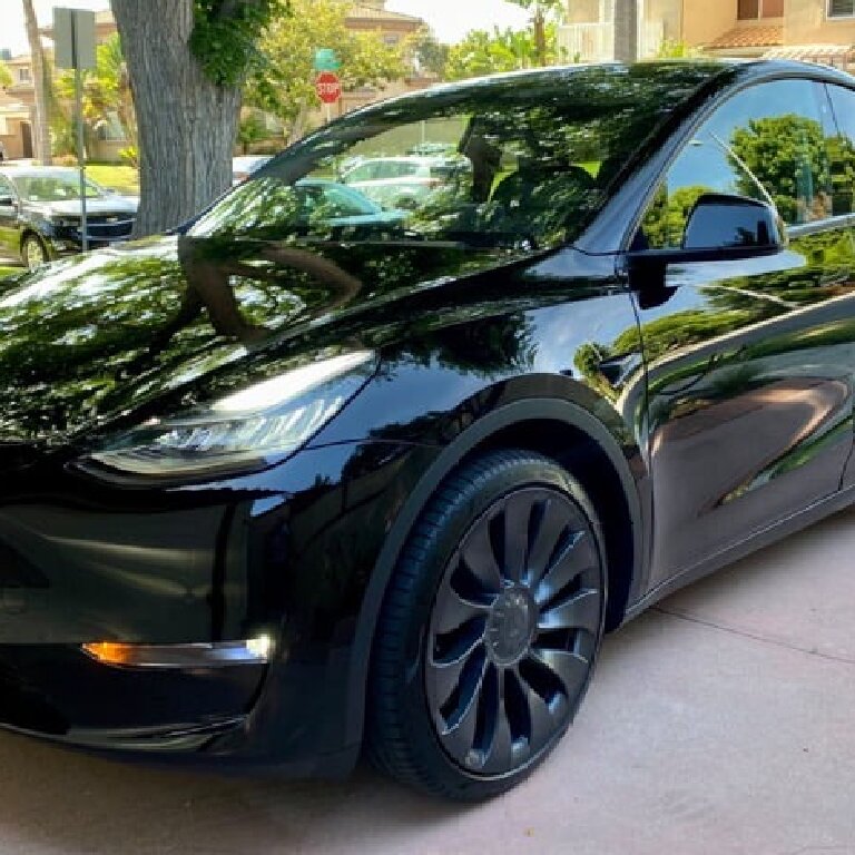 Mietwagen mit Fahrer: Tesla